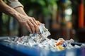 Caring individuals hand neatly recycles paper, aiming for the bin