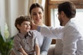 Caring male pediatrician cheer little boy patient Royalty Free Stock Photo