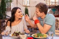 Smiling beaming woman feeling happy sitting near caring man