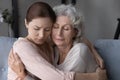 Loving daughter hug and comfort old upset mom Royalty Free Stock Photo