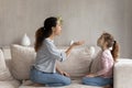 Caring mother with little daughter kid speaking, doing speech exercises Royalty Free Stock Photo