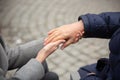 Female healthcare worker holding hands of senior woman during the walk Royalty Free Stock Photo