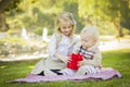 Caring Sister Gives Her Baby Brother A Gift at Park