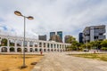 Carioca Aqueduct with Cathedral of Saint Sebastian and modern business buildings in the background, Rio De Janeiro, Brazil