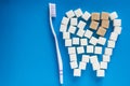 The carious tooth of sugar cubes Royalty Free Stock Photo