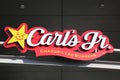 Carl`s jr logo on a wall