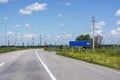 Carless highway with road markings and empty signposts