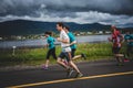 Group of 10K Runners in front of a beautiful Mountain Landscape Royalty Free Stock Photo