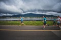 Lonely man Leading a Group of 10K Runners Royalty Free Stock Photo