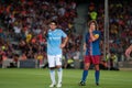 Carlos Tevez, Manchester City player, plays against Carles Puyol