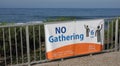 Carlsbad, CA / USA - April 21, 2020: Large sign reminds people of social distancing rules due to Covid-19