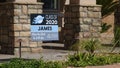 Carlsbad, CA / USA - May 11, 2020: A yard sign celebrates a 2020 graduate during pandemic shutdown.