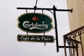 Carlsberg beer sign logo bar and text brand restaurant in french street