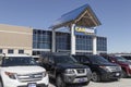 CarMax Auto Dealership used car display. CarMax is the largest used and pre-owned car retailer in the US Royalty Free Stock Photo