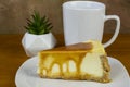 Carmel top cheese cake  with a cup of coffee Royalty Free Stock Photo