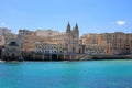 Carmelite church with city at Balluta Bay, Malta Royalty Free Stock Photo