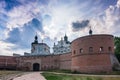 Carmelite monastery walls and dramatic sky in Berdychev