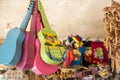 Carmen, Bohol, Philippines - Colorful guitars and other souvenirs for sale for tourists at a local store