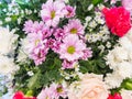 Carnation Bouquet and Roses, Pink and Red, with small white and purple flowers Royalty Free Stock Photo