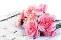 Carnation flower on calendar