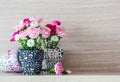 Carnation in mosaic flower pot