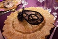 Carnaval table with venetian mask on the plate Royalty Free Stock Photo