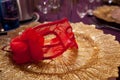 Carnaval table with venetian mask on the plate Royalty Free Stock Photo