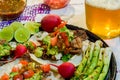 Carne asada tacos with craft beer in Tijuana with copy space Royalty Free Stock Photo
