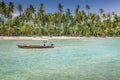 Carneiros idyllic beach with rustic boat at sunny day, in Northeastern Brazil