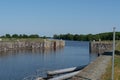 After the Carnet lock, at the western end of the Martiniere Canal, there is a port accessible to fishing boats, depending on the t