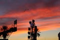 Carnival Bi-planes and Red and Orange sunset