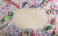 Carnival or birthday party. Confetti and serpentines on pastel grey background Royalty Free Stock Photo