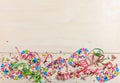 Carnival confetti and serpentines on white background, top niew Royalty Free Stock Photo