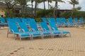 docked behind empty lounge chairs awaiting passengers at Amber Cover, the cruise lines privately owned port