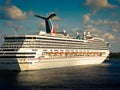 Carnival Freedom anchored in the port of Grand Cayman Royalty Free Stock Photo