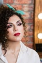 Carnival Makeup Pin Up Image. Curly hairstyle