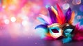 Carnival mask with bright feathers on a colored blurred background