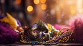 Carnival mask, colorful Mardi Gras beads and bokeh lights festive background Royalty Free Stock Photo