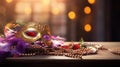 Carnival mask, colorful Mardi Gras beads and bokeh lights festive background Royalty Free Stock Photo