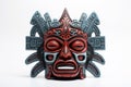 Carnival mask for festival. Aztec traditional ceremonial mask on white background. Warrior mask. Tribal totem