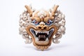 Carnival mask for the festival. Barong mask on white background. Traditional Balinese dance mask. Craftsmanship and