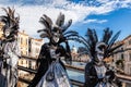 Carnival masks on bridge against Grand Canal in Venice, Italy Royalty Free Stock Photo