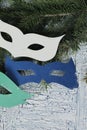 Carnival paper masks on wooden background