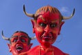 Putignano, Apulia, Italy - February 15, 2015: Carnival floats, giant paper mache. Face of devil.