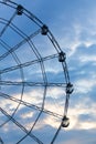 Carnival ride showing a spinning ferris wheel in action Royalty Free Stock Photo