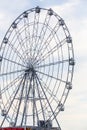 Carnival ride showing a spinning ferris wheel in action Royalty Free Stock Photo