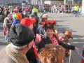 Carnival, school and quarter Procession parades, spectators at barriers in anticipation