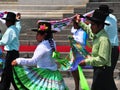 Carnival of Tacna Peru, tradition of Andean migration -couples dancing with multicolored clothes