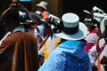 Carnival of Tacna Peru, tradition of Andean migration -couples dancing with multicolored clothes