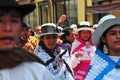 Carnival of Tacna Peru, tradition of Andean migration -couples dancing with multicolored clothes